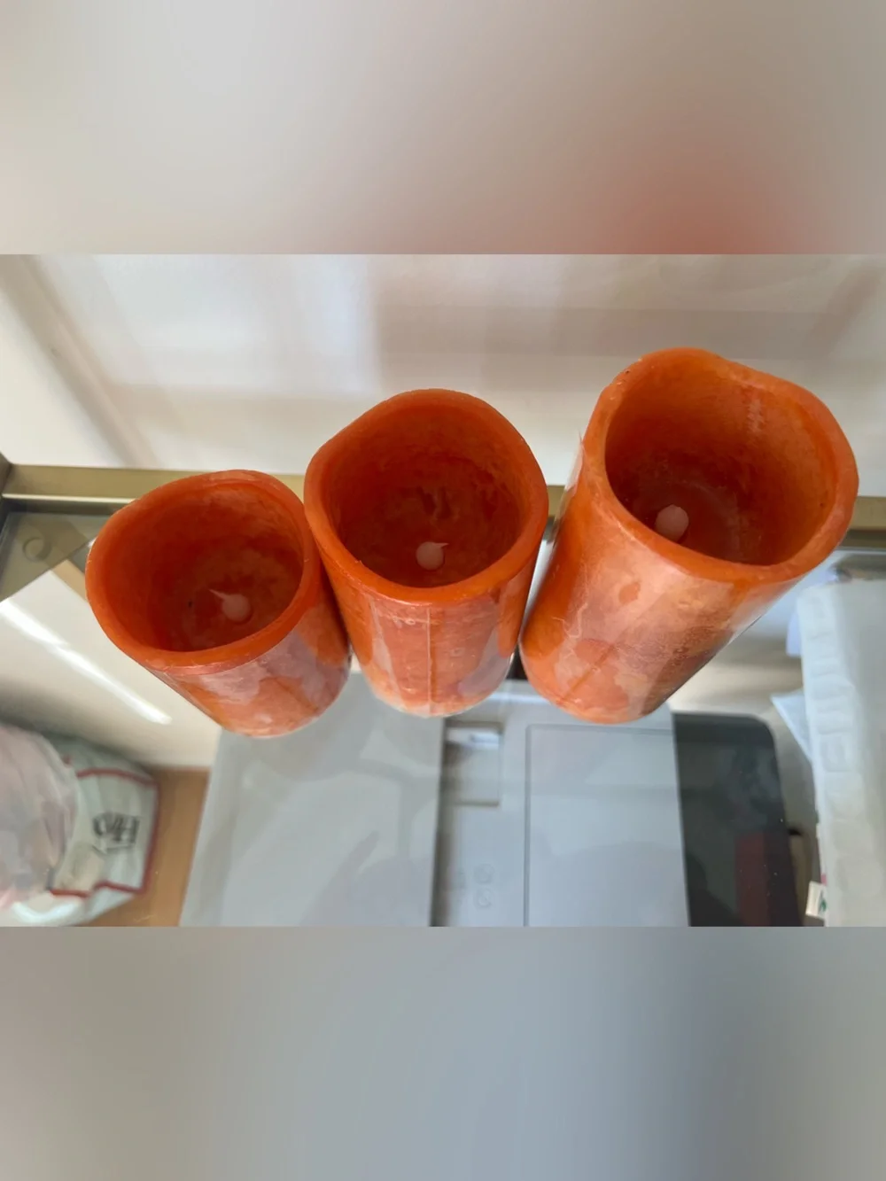Set of 3 orange pillar LED wax candles